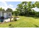 Spacious backyard with a patio, ideal for outdoor entertaining and recreation at 3515 Leslie Dr, Orlando, FL 32806