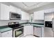 Well-equipped kitchen with stainless steel appliances at 3515 Leslie Dr, Orlando, FL 32806