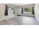 Bright living room featuring new flooring and natural light at 3515 Leslie Dr, Orlando, FL 32806
