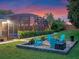 Inviting backyard with fire pit, lounge chairs, mature trees, manicured lawn and screened in pool at 3619 King George Dr, Orlando, FL 32835