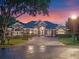 Stunning home with a manicured front lawn, elegant landscaping, and inviting curb appeal at 3619 King George Dr, Orlando, FL 32835