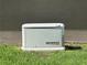 Generac whole house generator installed on a green lawn at 3619 King George Dr, Orlando, FL 32835