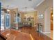 Spacious living area with hardwood floors, natural light, and easy access to the kitchen and other living spaces at 3619 King George Dr, Orlando, FL 32835