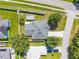 Aerial view of the home, showing the roof, fenced backyard and neighborhood streets at 401 Gannet Ct, Kissimmee, FL 34759