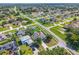 Aerial view of the property showcases its location within a well-maintained neighborhood at 401 Gannet Ct, Kissimmee, FL 34759