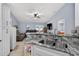 Kitchen with granite countertops, stainless steel sink, and an open concept floor plan at 401 Gannet Ct, Kissimmee, FL 34759