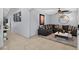 Cozy living area with neutral colors, stylish decor and a sleek dark-gray sofa at 401 Gannet Ct, Kissimmee, FL 34759