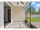 Open patio with access to home and fenced backyard at 413 Pursley Dr, Deland, FL 32724