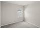 Clean bedroom featuring a modern window shade and ample natural light at 4301 Creek Bank Dr, Kissimmee, FL 34744