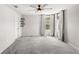 Spacious bedroom with plush carpet, ceiling fan and abundant natural light at 4301 Creek Bank Dr, Kissimmee, FL 34744