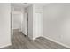 This is a light-filled bedroom with sleek floors and a closet at 4301 Creek Bank Dr, Kissimmee, FL 34744