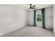 Comfortable bedroom featuring a ceiling fan and scenic view from the window at 4301 Creek Bank Dr, Kissimmee, FL 34744