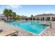 Large community pool with ample seating, shaded pavilion, and well-maintained landscaping at 4301 Creek Bank Dr, Kissimmee, FL 34744