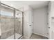Glass enclosed shower with bench and tiled walls at 4301 Creek Bank Dr, Kissimmee, FL 34744