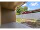 This backyard has a covered patio and a privacy fence at 435 Boxwood Cir, Winter Springs, FL 32708