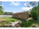 This home features a spacious backyard with potential for outdoor living at 435 Boxwood Cir, Winter Springs, FL 32708