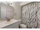 Bathroom featuring a modern vanity with framed mirror and a shower/tub combination at 435 Boxwood Cir, Winter Springs, FL 32708
