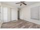 Spacious bedroom with ample closet space, wood flooring, and natural light at 435 Boxwood Cir, Winter Springs, FL 32708