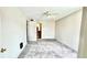 Bedroom with neutral walls, carpet, ceiling fan, and an en suite bathroom at 5500 Devonbriar Way # 202, Orlando, FL 32822