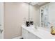 Bathroom with a large mirror over the vanity, providing a bright and functional space at 621 Estates Pl, Longwood, FL 32779