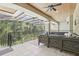 Spacious covered patio area featuring an outdoor seating area and a ceiling fan at 621 Estates Pl, Longwood, FL 32779