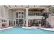 Beautiful pool with upper level balcony, spiral staircase, and ample outdoor space at 621 Estates Pl, Longwood, FL 32779