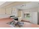Bright kitchen features an oven, microwave, and stainless steel double sink at 628 Olympic Dr # 8-C, Ocoee, FL 34761