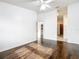 Bright bedroom featuring wood floors with an ensuite bathroom at 709 Orchid Dr, Davenport, FL 33897