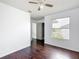 Bright bedroom with hardwood floors, ceiling fan, and window offering a comfortable retreat at 709 Orchid Dr, Davenport, FL 33897