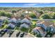 Charming townhomes featuring neat landscaping, dedicated parking, and inviting exterior design at 709 Orchid Dr, Davenport, FL 33897