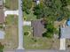 An aerial shot provides a bird's-eye view of the home and its surrounding neighborhood at 73 Alano Rd, Debary, FL 32713
