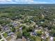 Neighborhood aerial showcasing the property with ample space, mature trees, and easy access to local amenities at 73 Alano Rd, Debary, FL 32713
