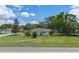 The aerial view captures the home's exterior, landscaping, and its location in a residential neighborhood at 73 Alano Rd, Debary, FL 32713