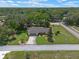 Drone photo of house with a red line showing the border of the property at 73 Alano Rd, Debary, FL 32713