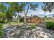 Expansive backyard showcasing a wooden deck, mature trees, and well-maintained landscaping, perfect for outdoor enjoyment at 73 Alano Rd, Debary, FL 32713