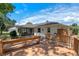 Wooden deck with outdoor shower, seating area, and screened in porch provides a serene outdoor retreat at 73 Alano Rd, Debary, FL 32713