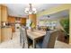 Open floor plan from dining room to the living room with a view of the kitchen at 73 Alano Rd, Debary, FL 32713
