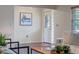 Welcoming entryway with a decorative door and a framed 'Home at last' sign at 73 Alano Rd, Debary, FL 32713
