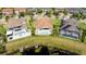 Aerial view of backyard featuring a pool and lake access at 7388 John Hancock Dr, Winter Garden, FL 34787