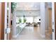 Grand foyer with a modern chandelier and an open floor plan at 7388 John Hancock Dr, Winter Garden, FL 34787