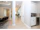 Hallway that connects the dining area with a butler's pantry and other areas at 7388 John Hancock Dr, Winter Garden, FL 34787