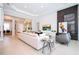 Spacious living room with a large sectional sofa and modern decor at 7388 John Hancock Dr, Winter Garden, FL 34787