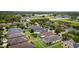 An aerial view shows this neighborhood's nice homes and yards, and also the community's proximity to local schools and businesses at 7557 Azalea Cove Cir, Orlando, FL 32807