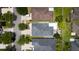 Aerial view of houses with neat rooftops and manicured lawns in a residential setting at 7557 Azalea Cove Cir, Orlando, FL 32807