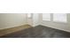 Living Room featuring dark wood flooring and white trim at 7557 Azalea Cove Cir, Orlando, FL 32807