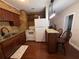 Kitchen with granite countertops, dark wood cabinets and stainless steel sink at 7709 Ravenna Ave, Orlando, FL 32819