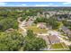 Aerial view of the neighborhood with mature trees and quiet streets at 7939 Riffle Ln, Orlando, FL 32818