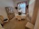 Formal dining room with chandelier and elegant furnishings at 8603 Snowfire Dr, Orlando, FL 32818