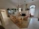 An inviting living room is styled with a fireplace, decor, and comfortable furniture at 8603 Snowfire Dr, Orlando, FL 32818