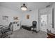 Spacious office featuring a desk, chair, storage, and view to another bedroom at 873 Daring Dr, Davenport, FL 33837
